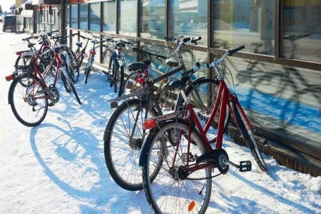 Cycles parked on snow-covered streets of Rovaniemi