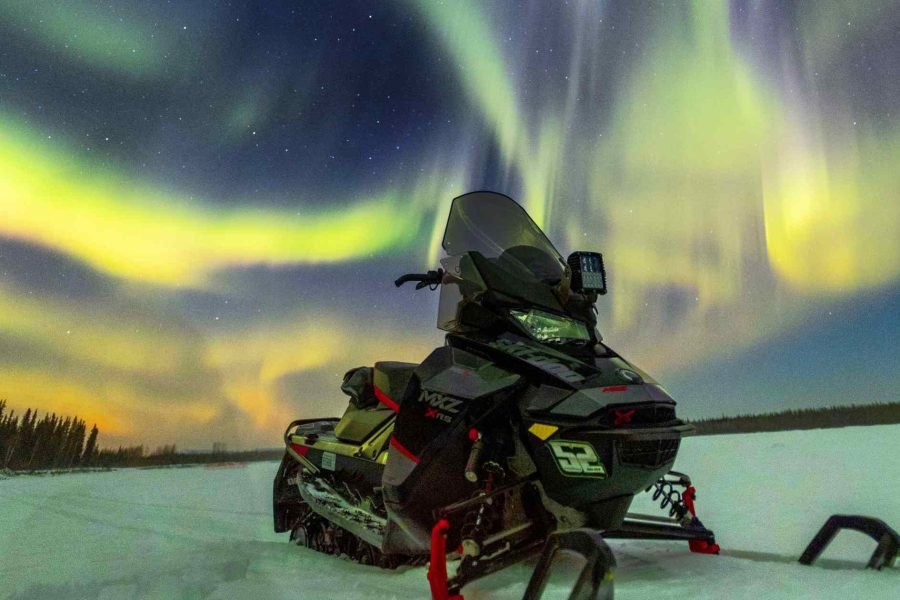 Northern lights hunt by snowmobile in Rovaniemi